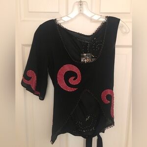 New with tags. Unique Top by New York Speed.